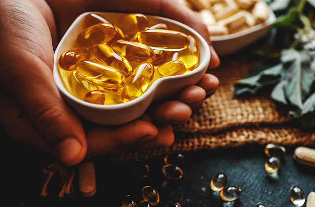 Capsules being sorted in a factory machine